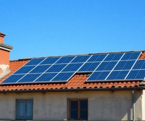 Connecting 100W and 200W solar panels safely using the correct series or parallel wiring configuration.