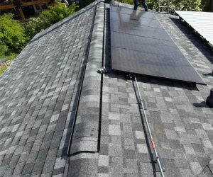 solar panels installed on newly replaced roof with modern roofing system